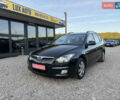 Черный Хендай i30, объемом двигателя 1.4 л и пробегом 146 тыс. км за 5800 $, фото 1 на Automoto.ua