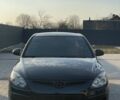 Черный Хендай i30, объемом двигателя 1.1 л и пробегом 223 тыс. км за 5500 $, фото 1 на Automoto.ua