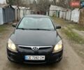 Черный Хендай i30, объемом двигателя 1.4 л и пробегом 175 тыс. км за 4750 $, фото 1 на Automoto.ua