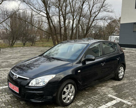 Черный Хендай i30, объемом двигателя 1.4 л и пробегом 140 тыс. км за 6300 $, фото 14 на Automoto.ua