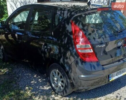 Черный Хендай i30, объемом двигателя 1.4 л и пробегом 275 тыс. км за 4700 $, фото 3 на Automoto.ua