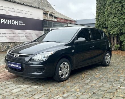 Черный Хендай i30, объемом двигателя 1.4 л и пробегом 240 тыс. км за 6000 $, фото 5 на Automoto.ua