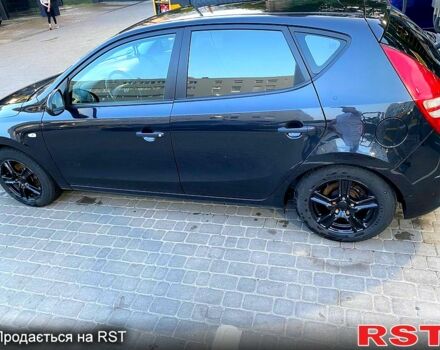Чорний Хендай i30, об'ємом двигуна 1.4 л та пробігом 194 тис. км за 6000 $, фото 3 на Automoto.ua