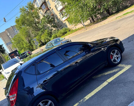 Чорний Хендай i30, об'ємом двигуна 1.6 л та пробігом 190 тис. км за 6300 $, фото 7 на Automoto.ua