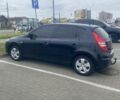 Черный Хендай i30, объемом двигателя 1.4 л и пробегом 240 тыс. км за 6500 $, фото 1 на Automoto.ua
