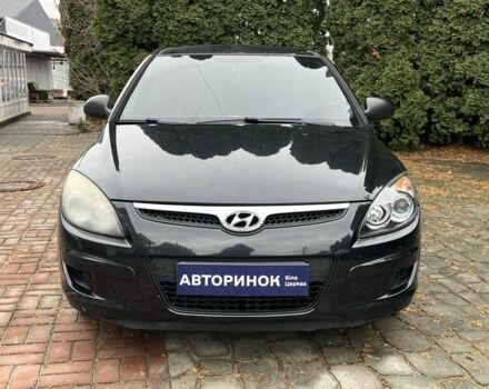 Черный Хендай i30, объемом двигателя 1.4 л и пробегом 240 тыс. км за 6000 $, фото 6 на Automoto.ua