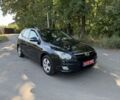 Черный Хендай i30, объемом двигателя 1.4 л и пробегом 193 тыс. км за 6577 $, фото 1 на Automoto.ua