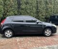 Черный Хендай i30, объемом двигателя 1.4 л и пробегом 240 тыс. км за 6000 $, фото 1 на Automoto.ua