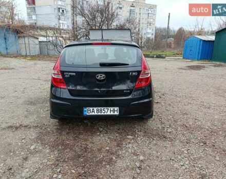 Черный Хендай i30, объемом двигателя 1.4 л и пробегом 314 тыс. км за 5650 $, фото 4 на Automoto.ua