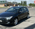 Черный Хендай i30, объемом двигателя 1.6 л и пробегом 194 тыс. км за 9700 $, фото 1 на Automoto.ua