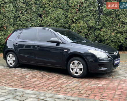 Черный Хендай i30, объемом двигателя 1.4 л и пробегом 240 тыс. км за 6000 $, фото 1 на Automoto.ua