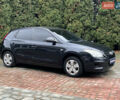 Черный Хендай i30, объемом двигателя 1.4 л и пробегом 240 тыс. км за 6000 $, фото 1 на Automoto.ua