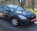 Черный Хендай i30, объемом двигателя 1.4 л и пробегом 163 тыс. км за 6300 $, фото 1 на Automoto.ua