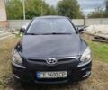 Черный Хендай i30, объемом двигателя 1.4 л и пробегом 215 тыс. км за 5500 $, фото 1 на Automoto.ua