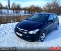 Черный Хендай i30, объемом двигателя 1.4 л и пробегом 248 тыс. км за 5500 $, фото 1 на Automoto.ua