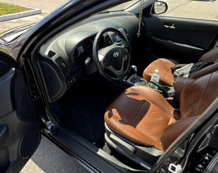 Черный Хендай i30, объемом двигателя 1.6 л и пробегом 194 тыс. км за 9700 $, фото 12 на Automoto.ua