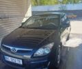 Черный Хендай i30, объемом двигателя 1.4 л и пробегом 287 тыс. км за 5800 $, фото 1 на Automoto.ua