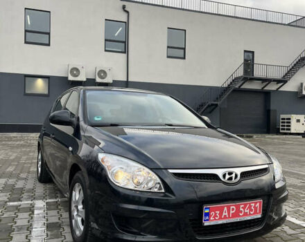 Черный Хендай i30, объемом двигателя 1.4 л и пробегом 140 тыс. км за 6300 $, фото 5 на Automoto.ua