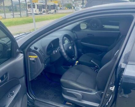 Черный Хендай i30, объемом двигателя 1.4 л и пробегом 240 тыс. км за 6500 $, фото 7 на Automoto.ua