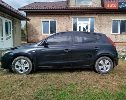 Черный Хендай i30, объемом двигателя 1.4 л и пробегом 215 тыс. км за 5000 $, фото 7 на Automoto.ua