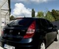 Черный Хендай i30, объемом двигателя 1.4 л и пробегом 147 тыс. км за 6800 $, фото 4 на Automoto.ua