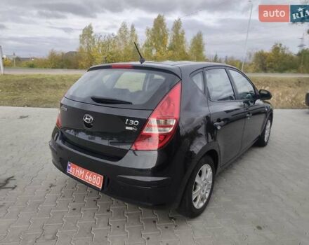 Черный Хендай i30, объемом двигателя 1.4 л и пробегом 160 тыс. км за 5999 $, фото 1 на Automoto.ua