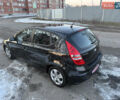 Черный Хендай i30, объемом двигателя 1.4 л и пробегом 194 тыс. км за 6200 $, фото 1 на Automoto.ua