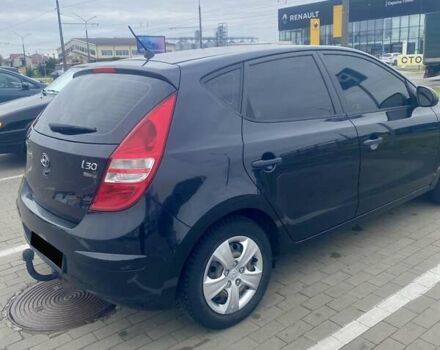 Черный Хендай i30, объемом двигателя 1.4 л и пробегом 240 тыс. км за 6500 $, фото 2 на Automoto.ua