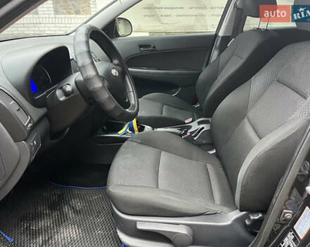 Черный Хендай i30, объемом двигателя 1.4 л и пробегом 240 тыс. км за 6000 $, фото 12 на Automoto.ua