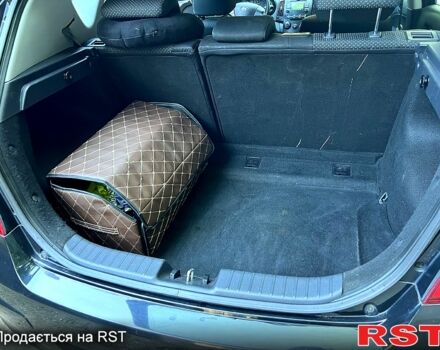 Черный Хендай i30, объемом двигателя 1.6 л и пробегом 250 тыс. км за 5700 $, фото 6 на Automoto.ua