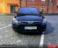 Черный Хендай i30, объемом двигателя 1.4 л и пробегом 142 тыс. км за 6950 $, фото 1 на Automoto.ua