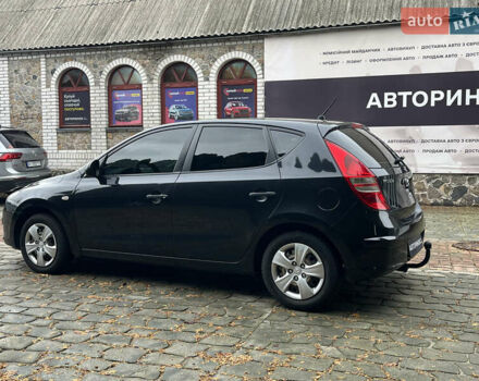Черный Хендай i30, объемом двигателя 1.4 л и пробегом 240 тыс. км за 6000 $, фото 6 на Automoto.ua