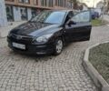 Черный Хендай i30, объемом двигателя 1.4 л и пробегом 174 тыс. км за 4800 $, фото 15 на Automoto.ua