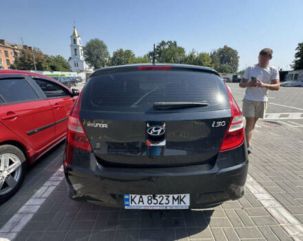 Черный Хендай i30, объемом двигателя 1.4 л и пробегом 215 тыс. км за 6000 $, фото 7 на Automoto.ua