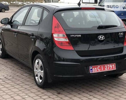 Чорний Хендай i30, об'ємом двигуна 1.6 л та пробігом 256 тис. км за 6099 $, фото 4 на Automoto.ua