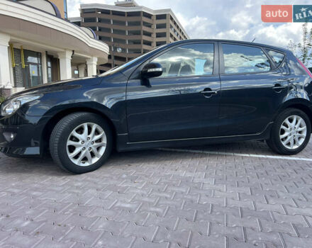 Чорний Хендай i30, об'ємом двигуна 1.4 л та пробігом 248 тис. км за 6950 $, фото 1 на Automoto.ua