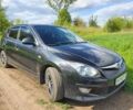Черный Хендай i30, объемом двигателя 1.4 л и пробегом 198 тыс. км за 7200 $, фото 1 на Automoto.ua