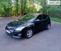 Черный Хендай i30, объемом двигателя 1.4 л и пробегом 288 тыс. км за 6800 $, фото 3 на Automoto.ua