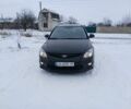Черный Хендай i30, объемом двигателя 1.6 л и пробегом 247 тыс. км за 5900 $, фото 1 на Automoto.ua