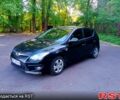 Черный Хендай i30, объемом двигателя 1.4 л и пробегом 288 тыс. км за 6800 $, фото 1 на Automoto.ua