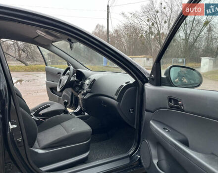 Чорний Хендай i30, об'ємом двигуна 1.4 л та пробігом 247 тис. км за 5800 $, фото 20 на Automoto.ua