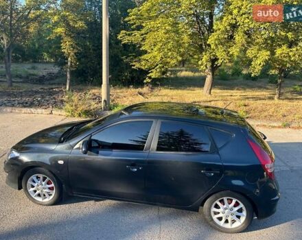 Черный Хендай i30, объемом двигателя 1.6 л и пробегом 219 тыс. км за 4700 $, фото 2 на Automoto.ua