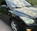 Черный Хендай i30, объемом двигателя 1.58 л и пробегом 289 тыс. км за 4100 $, фото 1 на Automoto.ua