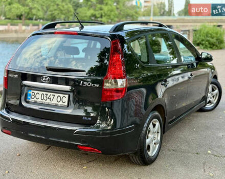 Черный Хендай i30, объемом двигателя 1.6 л и пробегом 198 тыс. км за 6600 $, фото 5 на Automoto.ua