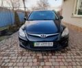 Черный Хендай i30, объемом двигателя 1.4 л и пробегом 215 тыс. км за 6200 $, фото 1 на Automoto.ua