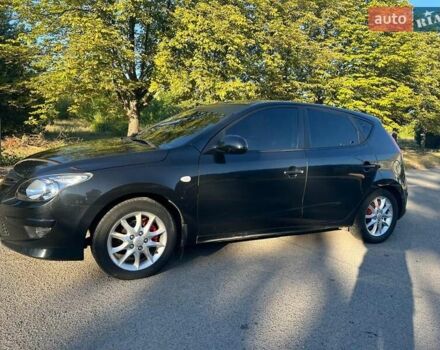 Черный Хендай i30, объемом двигателя 1.6 л и пробегом 219 тыс. км за 4700 $, фото 1 на Automoto.ua
