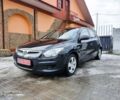 Черный Хендай i30, объемом двигателя 1.4 л и пробегом 240 тыс. км за 6100 $, фото 1 на Automoto.ua