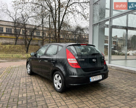 Чорний Хендай i30, об'ємом двигуна 1.4 л та пробігом 247 тис. км за 5800 $, фото 3 на Automoto.ua