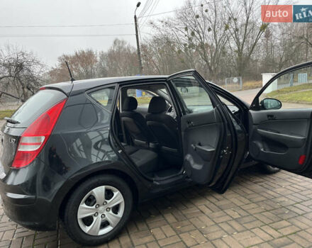 Чорний Хендай i30, об'ємом двигуна 1.4 л та пробігом 247 тис. км за 5800 $, фото 14 на Automoto.ua