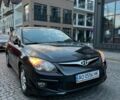 Черный Хендай i30, объемом двигателя 1.6 л и пробегом 240 тыс. км за 7000 $, фото 1 на Automoto.ua